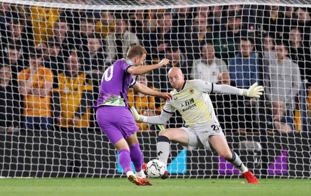 Harry Kane of Tottenham Hotspur scores their side's second goal past John Ruddy of Wolverhampton Wanderers during the Carabao Cup Third Round match...