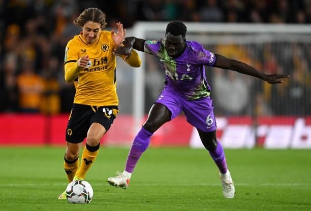 Fabio Silva of Wolverhampton Wanderers runs with the ball whilst under pressure from Davinson Sanchez of Tottenham Hotspur during the Carabao Cup...