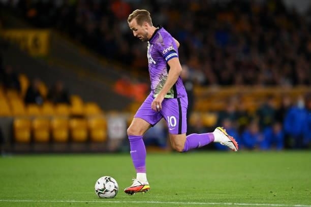 Harry Kane of Tottenham Hotspur runs with the ball during the Carabao Cup Third Round match between Wolverhampton Wanderers and Tottenham Hotspur at...