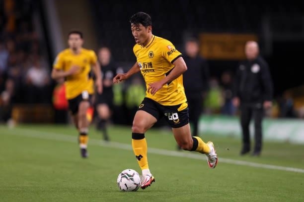 Hee Chan Hwang of Wolverhampton Wanderers runs with the ball during the Carabao Cup Third Round match between Wolverhampton Wanderers and Tottenham...
