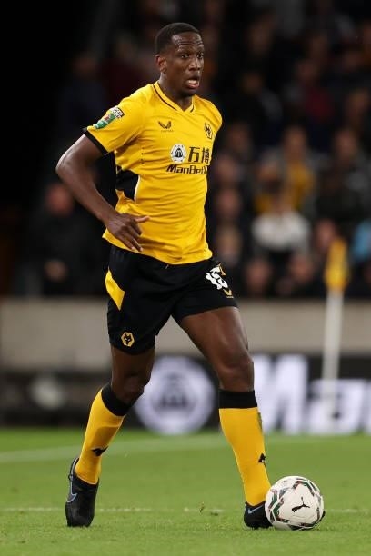 Willy Boly of Wolverhampton Wanderers runs with the ball during the Carabao Cup Third Round match between Wolverhampton Wanderers and Tottenham...