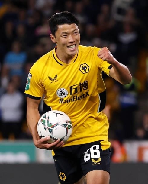 Hwang Hee-chan of Wolverhampton Wanderers celebrates after teammate Daniel Podence scores their teams second goal during the Carabao Cup Third Round...