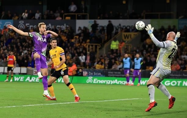 Harry Kane of Tottenham Hotspur has a header saved by John Ruddy of Wolverhampton Wanderers during the Carabao Cup Third Round match between...