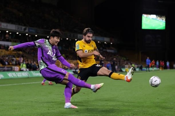 Heung-Min Son of Tottenham Hotspur is closed down by Ruben Neves of Wolverhampton Wanderers during the Carabao Cup Third Round match between...