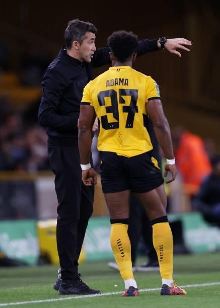 Bruno Lage, Manager of Wolverhampton Wanderers gives instructions to Adama Traore during the Carabao Cup Third Round match between Wolverhampton...