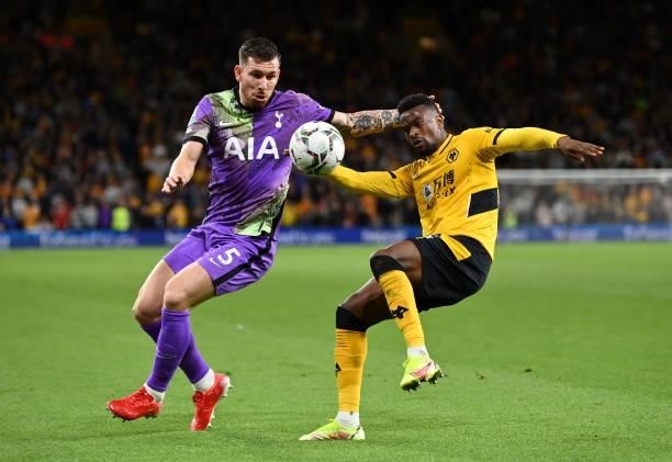 Nelson Semedo of Wolverhampton Wanderers battles for possession with Pierre-Emile Hojbjerg of Tottenham Hotspur during the Carabao Cup Third Round...