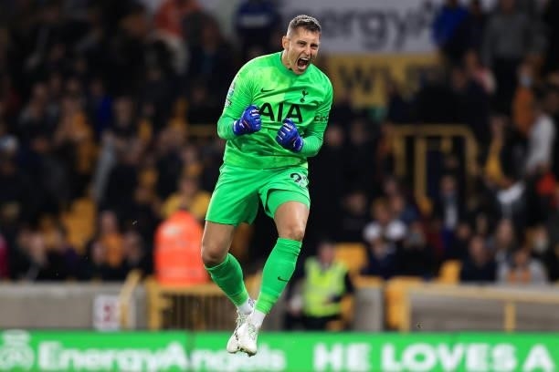Pierluigi Gollini of Tottenham Hotspur celebrates in the penalty shoot out during the Carabao Cup Third Round match between Wolverhampton Wanderers...