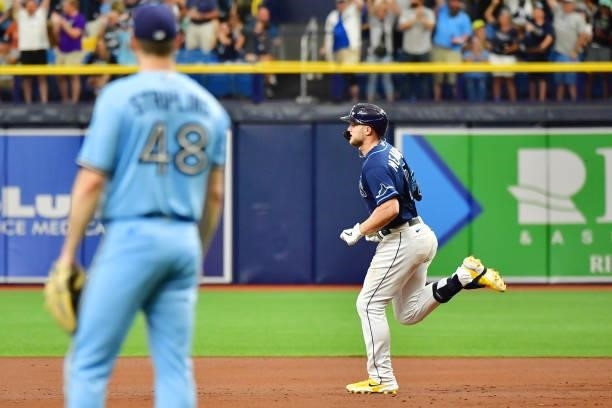 Austin Meadows of the Tampa Bay Rays runs the bases after hitting a 3-run home run off of Ross Stripling of the Toronto Blue Jays in the third inning...