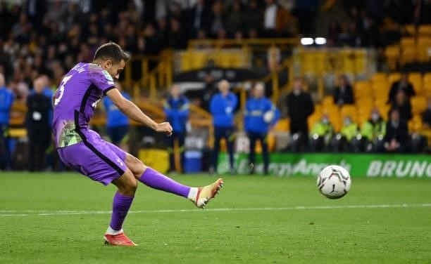 Sergio Reguilon of Tottenham Hotspur scores in the penalty shootout during the Carabao Cup Third Round match between Wolverhampton Wanderers and...