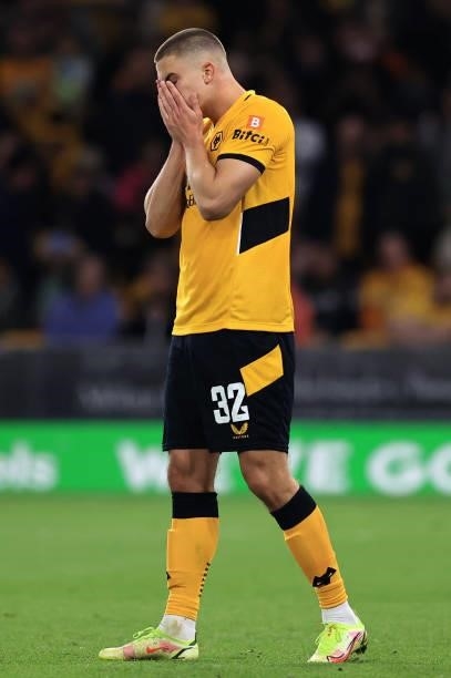 Leander Dendoncker of Wolverhampton Wanderers looks dejected after missing a penalty in the penalty shoot out during the Carabao Cup Third Round...