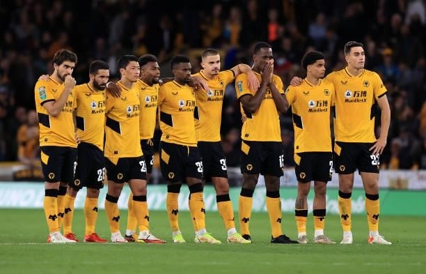 Players of Wolverhampton Wanderers look dejected in the penalty shoot out during the Carabao Cup Third Round match between Wolverhampton Wanderers...