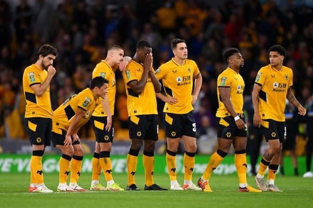 Players of Wolverhampton Wanderers look dejected after losing in the penalty shoot out during the Carabao Cup Third Round match between Wolverhampton...