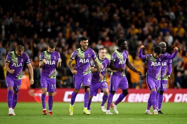Harry Kane, Ben Davies, Cristian Romero, Oliver Skipp, Davinson Sanchez, Heung-Min Son and Tanguy Ndombele of Tottenham Hotspur celebrates after...