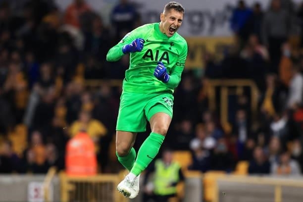 Pierluigi Gollini of Tottenham Hotspur celebrates his sides victory in the penalty shootout in the Carabao Cup Third Round match between...