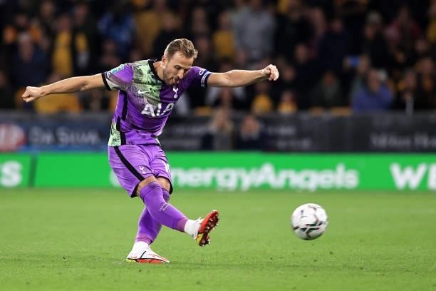 Harry Kane of Tottenham Hotspur scores their side's first penalty in the penalty shoot out during the Carabao Cup Third Round match between...
