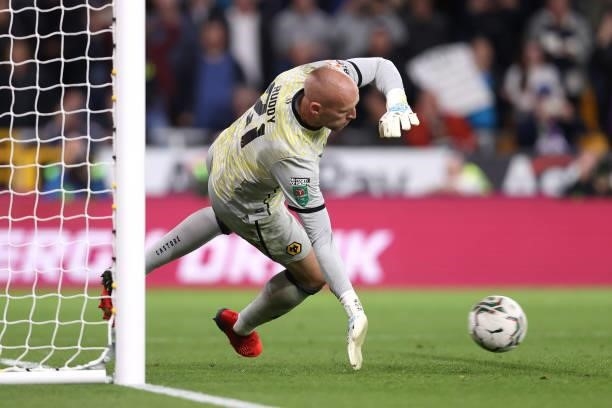 John Ruddy of Wolverhampton Wanderers saves the penalty from Pierre-Emile Hojbjerg of Tottenham Hotspur during the penalty shootout in the Carabao...