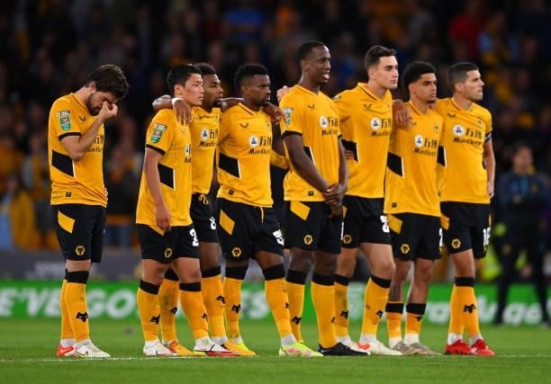 Players of Wolverhampton Wanderers look dejected following their sides defeat in the Carabao Cup Third Round match between Wolverhampton Wanderers...