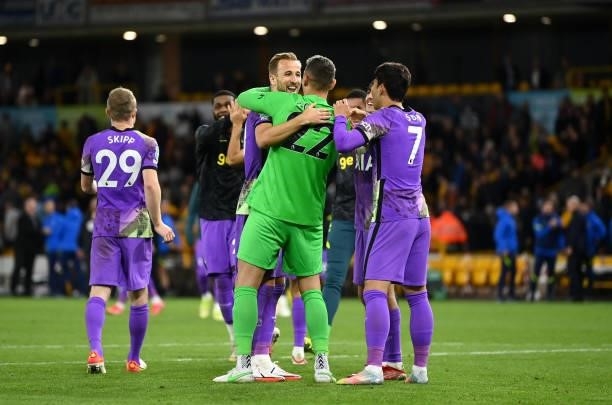 Harry Kane of Tottenham Hotspur celebrates with teammate Pierluigi Gollini after victory in the Carabao Cup Third Round match between Wolverhampton...
