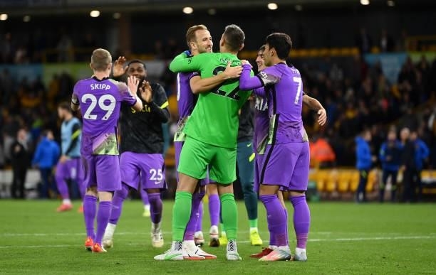 Harry Kane of Tottenham Hotspur celebrates with teammate Pierluigi Gollini after victory in the Carabao Cup Third Round match between Wolverhampton...