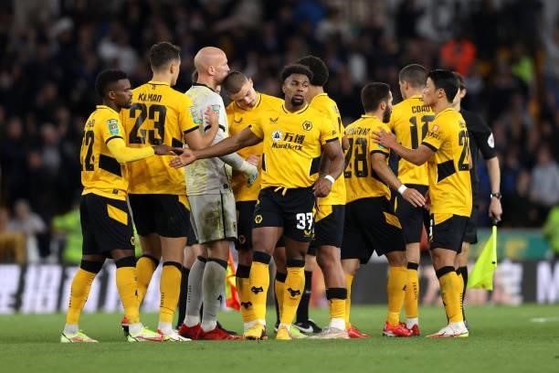 Wolverhampton Wanderers players react after their sides defeat in the Carabao Cup Third Round match between Wolverhampton Wanderers and Tottenham...