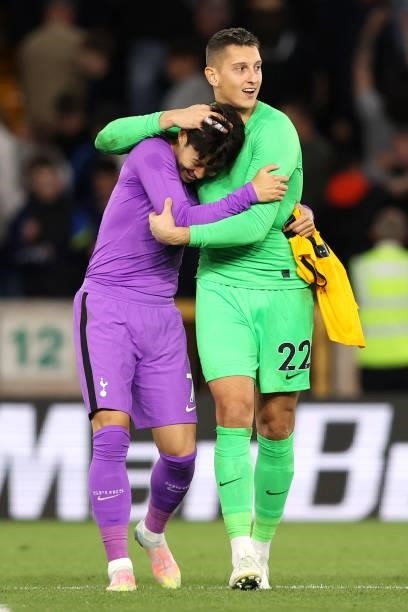 Heung-Min Son and Pierluigi Gollini of Tottenham Hotspur celebrate after victory in the Carabao Cup Third Round match between Wolverhampton Wanderers...