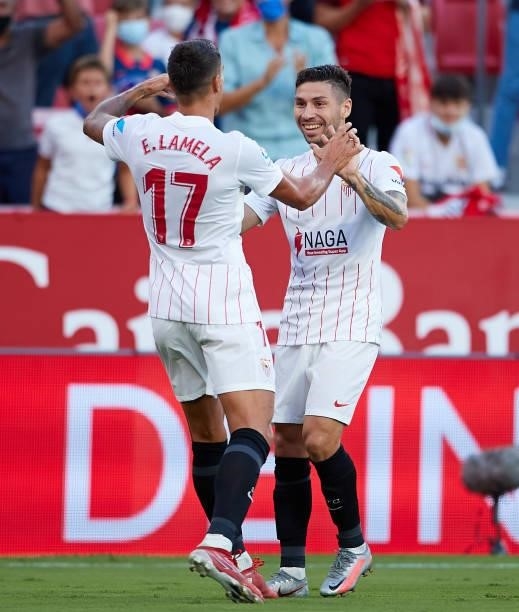 Gonzalo Montiel of Sevilla FC celebrates scoring their teams first goal with team mates during the La Liga Santander match between Sevilla FC and...