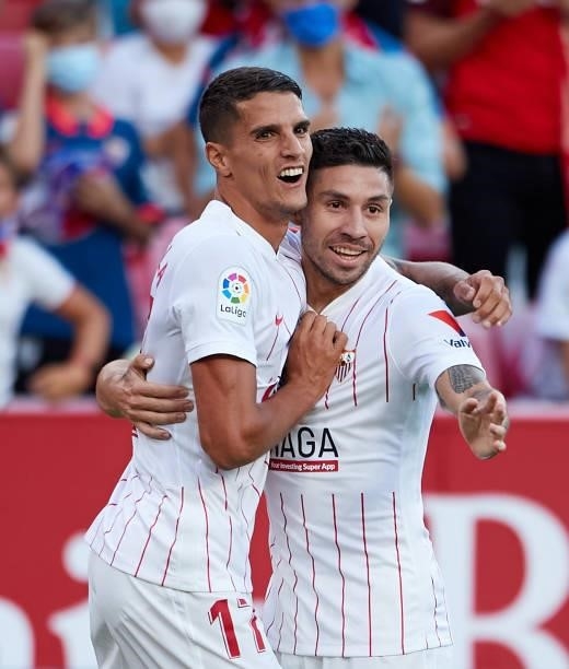 Gonzalo Montiel of Sevilla FC celebrates scoring their teams first goal with team mates during the La Liga Santander match between Sevilla FC and...