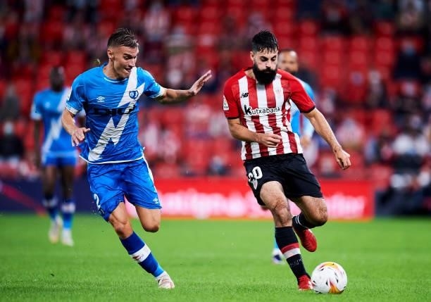 Asier Villalibre of Athletic Club duels for the ball with Nikola Maras of Rayo Vallecano during the La Liga Santander match between Athletic Club and...
