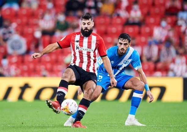 Asier Villalibre of Athletic Club duels for the ball with Alejandro Catena of Rayo Vallecano during the La Liga Santander match between Athletic Club...