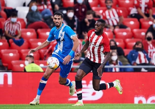 Inaki Williams of Athletic Club duels for the ball with Alejandro Catena of Rayo Vallecano during the La Liga Santander match between Athletic Club...