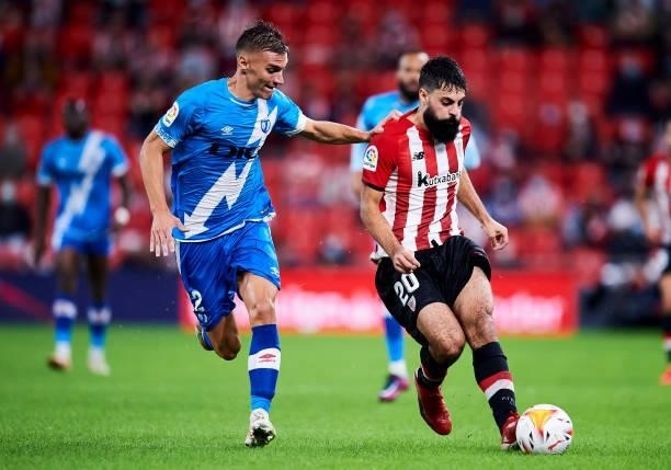 Asier Villalibre of Athletic Club duels for the ball with Nikola Maras of Rayo Vallecano during the La Liga Santander match between Athletic Club and...