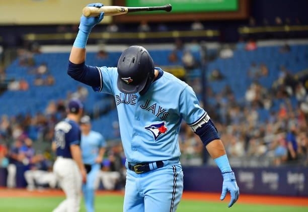 Lourdes Gurriel Jr. #13 of the Toronto Blue Jays reacts after striking out in the fourth inning to against the Tampa Bay Rays at Tropicana Field on...