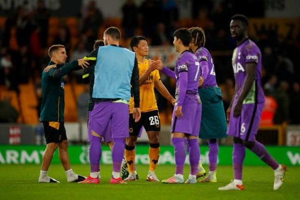South Korean footballers Hee-Chan Hwang of Wolverhampton Wanderers and Heung-Min Son of Tottenham Hotspur chat following the Carabao Cup Third Round...