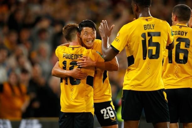 Daniel Podence of Wolverhampton Wanderers celebrates with Hee-Chan Hwang during the Carabao Cup Third Round match between Wolverhampton Wanderers and...