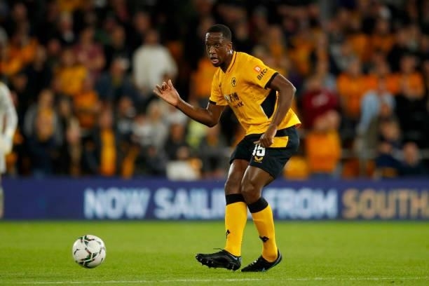 Willy Boly of Wolverhampton Wanderers passes the ball during the Carabao Cup Third Round match between Wolverhampton Wanderers and Tottenham Hotspur...