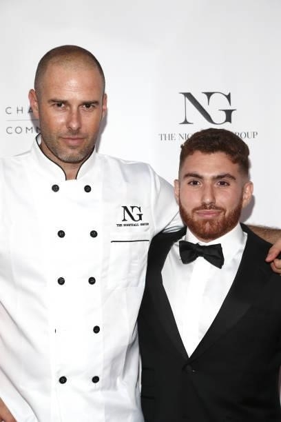 Yoav Schverd and Ronnie Benarie attend the The Nightfall Group Collaborates With The BHCC For A Black Tie Event on September 22, 2021 in Beverly...