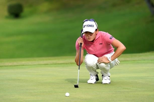 Chisato Iwai of Japan lines up a putt on the 18th green during the first round of the Chugoku Shimbun Chupea Ladies Cup at the Geinan Country Club on...