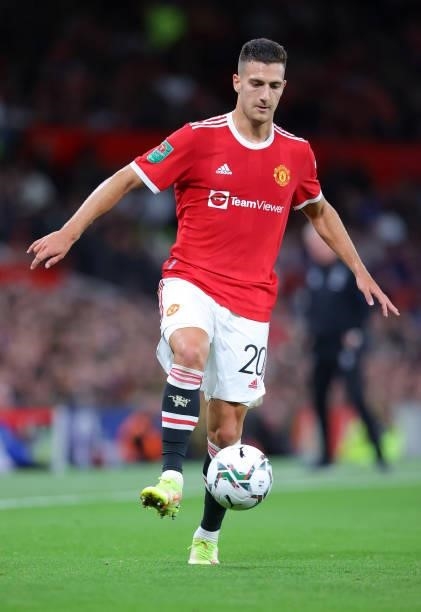 Diogo Dalot of Manchester United controls the ball during the Carabao Cup Third Round match between Manchester United and West Ham United at Old...