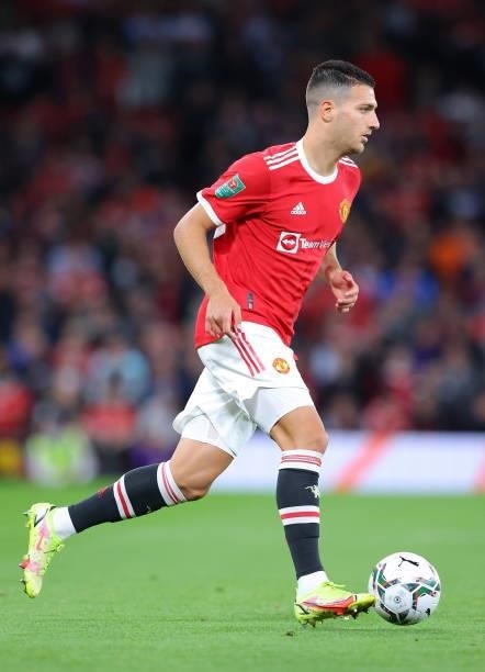 Diogo Dalot of Manchester United runs with the ball during the Carabao Cup Third Round match between Manchester United and West Ham United at Old...