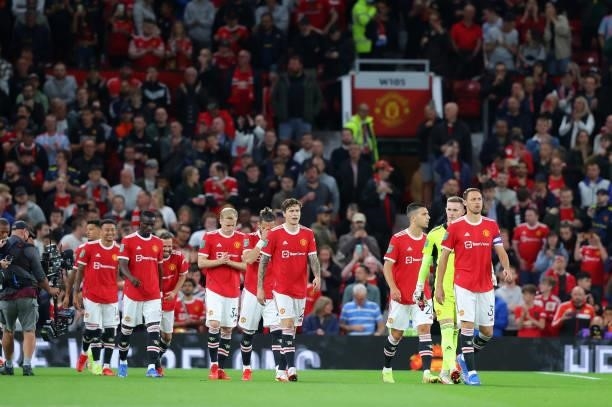 The players of Manchester United walk out for the Carabao Cup Third Round match between Manchester United and West Ham United at Old Trafford on...