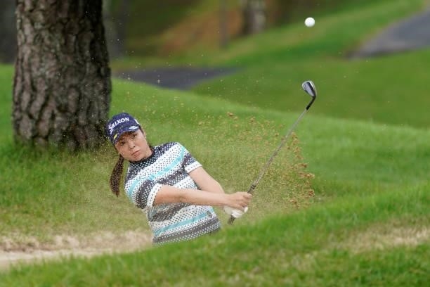Kaori Makitani of Japan hits out from a bunker on the 18th hole during the first round of the Chugoku Shimbun Chupea Ladies Cup at the Geinan Country...