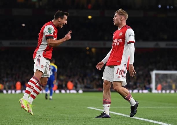 Emile Smith Rowe celebrates scoring Arsenal's 2nd goal with Cedric Soares during the Carabao Cup Third Round match between Arsenal and AFC Wimbledon...