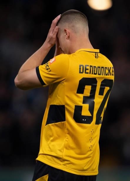 Leander Dendoncker of Wolverhampton Wanderers holds his head in his hands after seeing his penalty saved during the shoot out of the Carabao Cup...