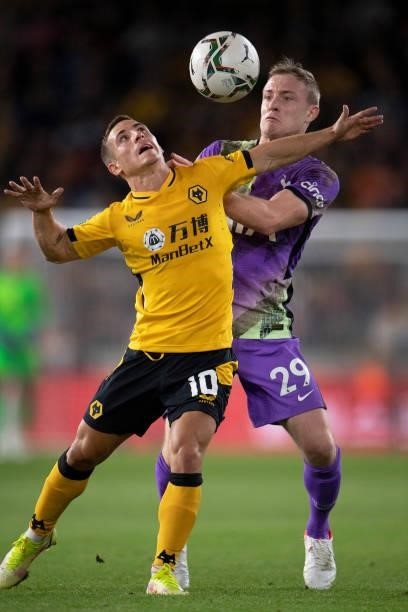 Daniel Podence of Wolverhampton Wanderers in action with Oliver Skipp of Tottenham Hotspur during the Carabao Cup Third Round match between...