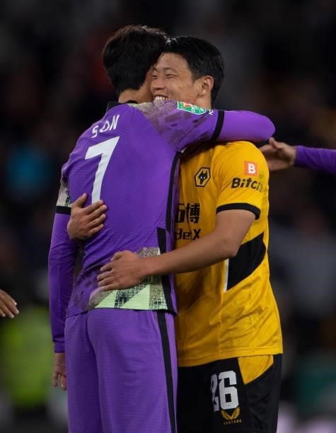 Hee Chan Hwang of Wolverhampton Wanderers and Heung-Min Son of Tottenham Hotspur after the Carabao Cup Third Round match between Wolverhampton...