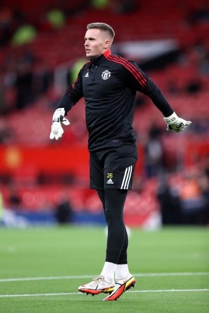 Dean Henderson of Manchester United warms up prior to the Carabao Cup Third Round match between Manchester United and West Ham United at Old Trafford...