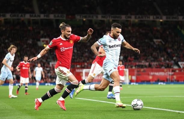 Ryan Fredericks of West Ham takes on Alex Telles of Manchester United during the Carabao Cup Third Round match between Manchester United and West Ham...