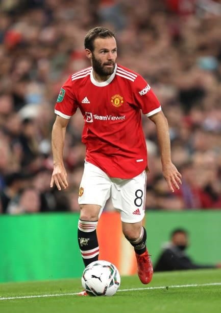 Juan Mata of Manchester United runs with the ball during the Carabao Cup Third Round match between Manchester United and West Ham United at Old...