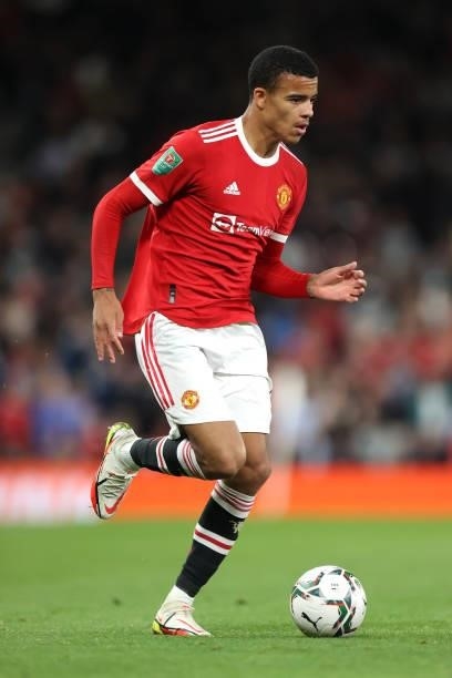 Mason Greenwood of Manchester United runs with the ball during the Carabao Cup Third Round match between Manchester United and West Ham United at Old...