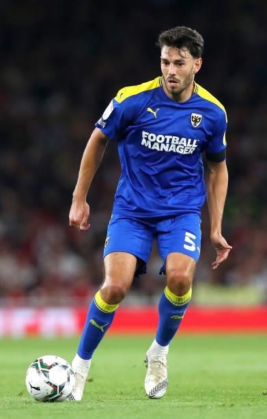 Will Nightingale of AFC Wimbledon controls the ball during the Carabao Cup Third Round match between Arsenal and AFC Wimbledon at Emirates Stadium on...